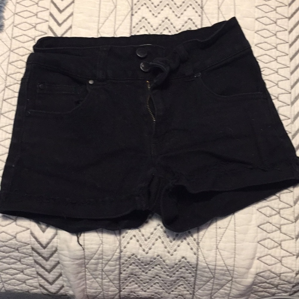 black shorts.